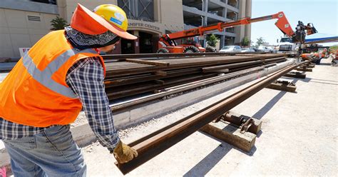 First steel rails of streetcar project welded