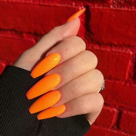 So, they coat the nails with hard and durable layer and function to beautify your extended another cute long acrylic nails can be achieved by painting your square coffin nails with a bright orange color. Orange acrylic nails | Orange acrylic nails, Orange nails ...