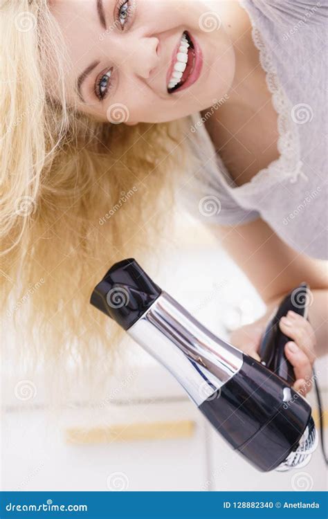 Blonde Woman Using Hair Dryer Stock Photo Image Of Drying