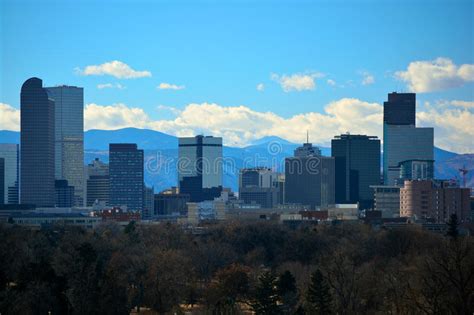 Downtown Denver Colorado Skyscrapers With The Rocky Mountains I Stock