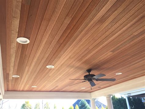 Gorgeous mahogany tongue and groove ceiling for an outdoor porch