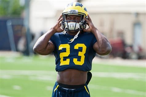 images from michigan football fall camp practice at al glick field house