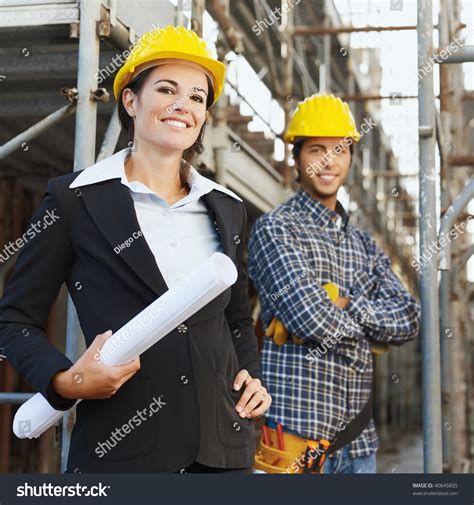 Portrait Of Construction Worker And Female Architect Stock Photo