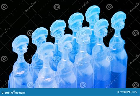 Blue Plastic Medical Ampoules Packaging On Black Stock Photo Image Of