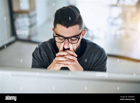 Staring At A Computer Screen Has Strained His Sight A Young Designer