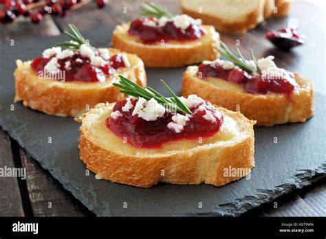 Holiday Crostini Appetizers With Cranberry Sauce Brie Feta And