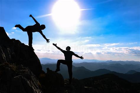 Mountaineering And Helping Hand Stock Photo Image Of Motivation