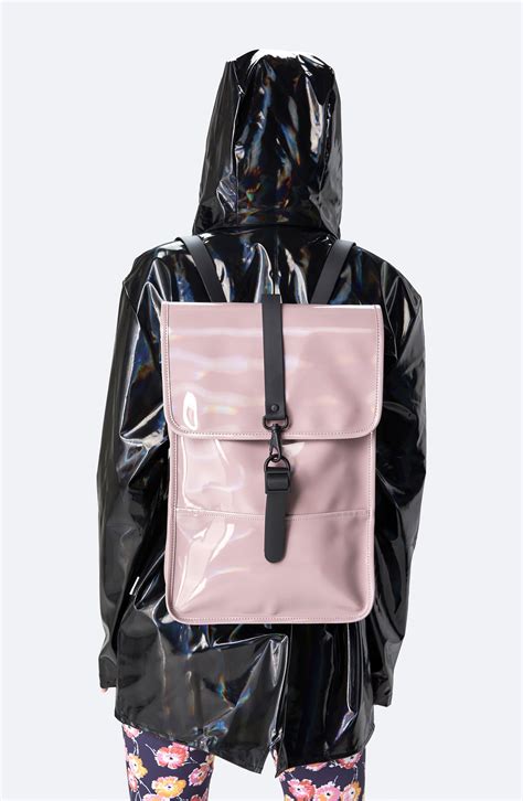 Fully lined, the minimalist waterproof backpacks are crafted with interior that is thoughtfully equipped to protect. Rains Mini Waterproof Holographic Backpack in Black - Lyst