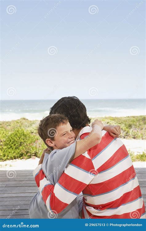 Father And Son Embracing Outdoors Stock Image Image Of Child Hugging