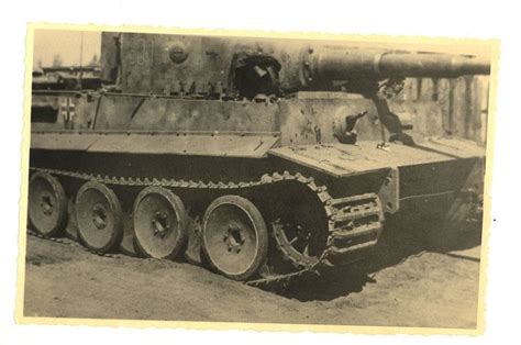 A Tiger 1 Knocked Out With A Large Hole In The Turret Tank Tiger