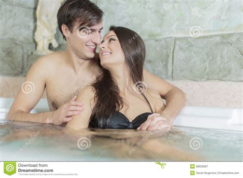 Couple Relaxing In The Hot Tub Stock Image Image Of