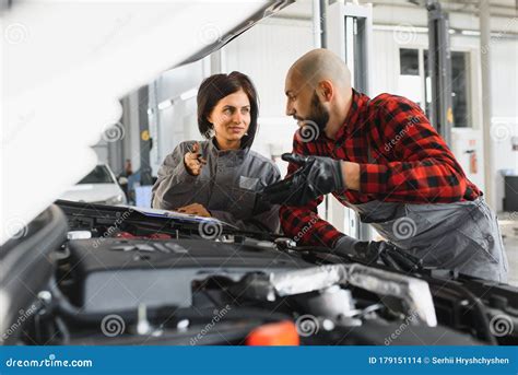 Auto Service Repair Maintenance And People Concept Mechanic Men