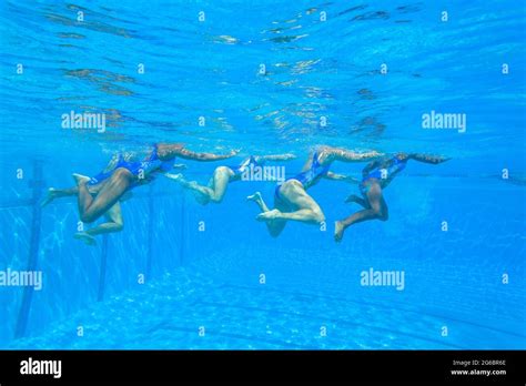 Girls Synchronized Team Dance Swimming Pool Under Water Photography