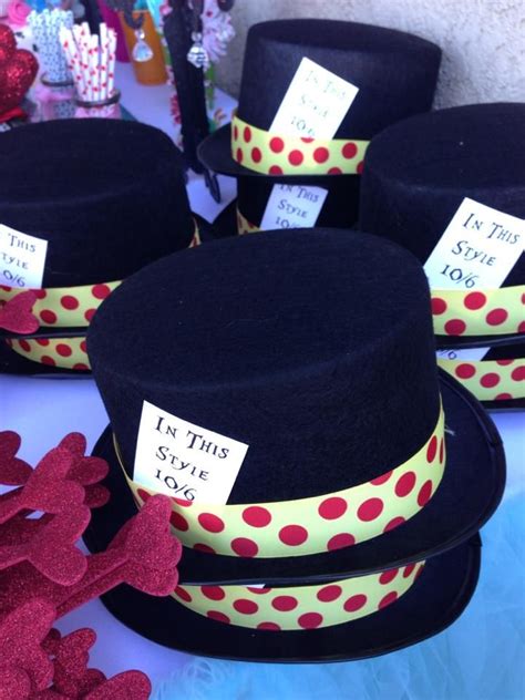 Several Hats With Red And White Polka Dots On Them