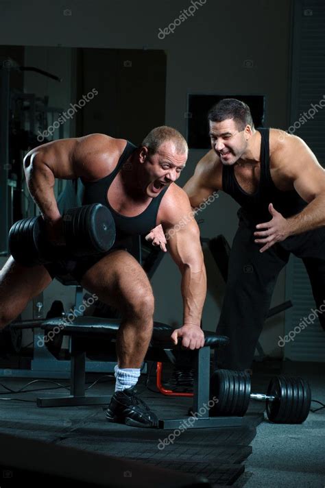 Two Bodybuilders Training In Gym — Stock Photo © Dontcut 4368362