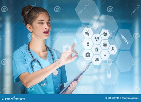 Woman Doctor Or Nurse Futuristic Concept That Is Using A Holographic
