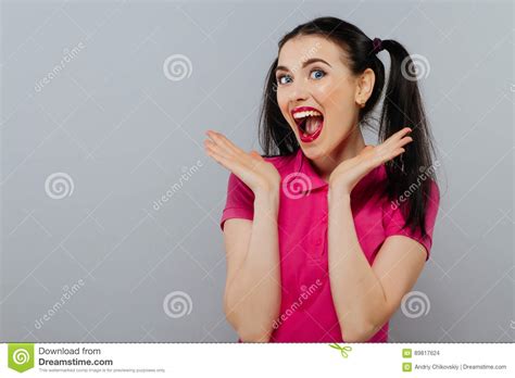Cheerful Fashion Girl Going Crazy Making Funny Face And Dancing Blue Color Background Hipster