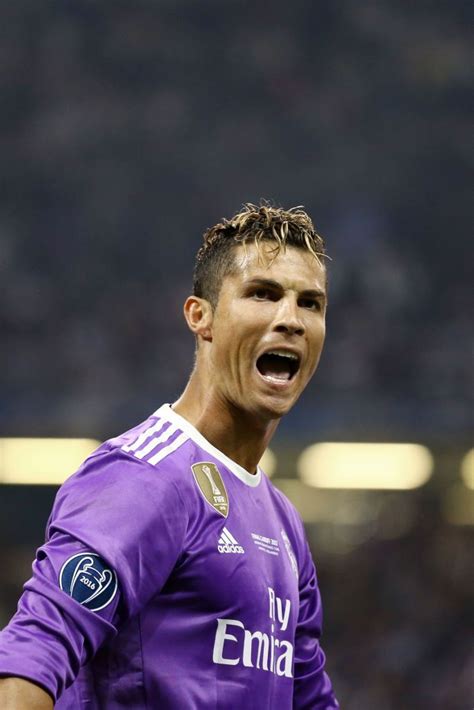 Cristiano Ronaldo Of Real Madrid Celebrating The Uefa Champions