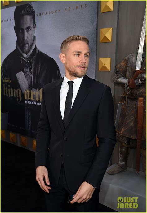 Charlie Hunnam Suits Up For King Arthur Premiere Photo
