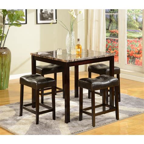 Put simply, counter height stools go with counter height tables and bar height stools go with bar height tables. Counter Height Table with Four Padded Stools