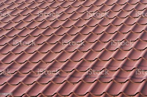 Red Metal Roof Tiles The Texture Of Shingles Stock Photo Download