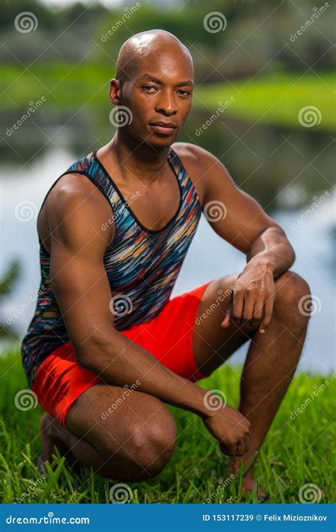 Portrait Of A Handsome Young Man In A Squatting Post Stock Image Image Of African Post 153117239