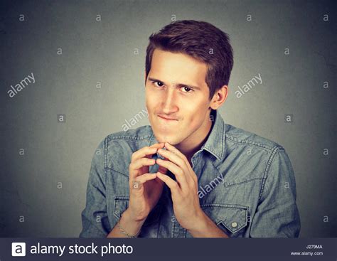 Free Download Sneaky Scheming Young Man Plotting Something Isolated