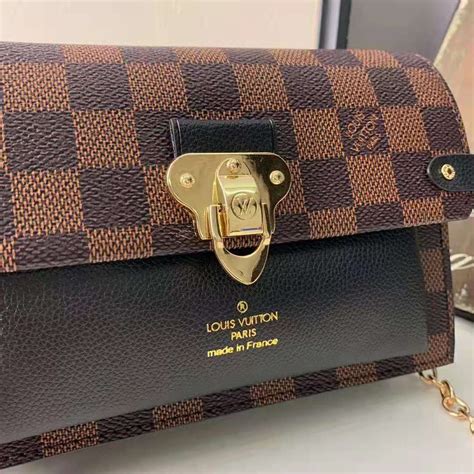 Louis vuitton zippy wallet monogram empreinte leather. Louis Vuitton LV Women Vavin Chain Wallet in Damier Ebene ...