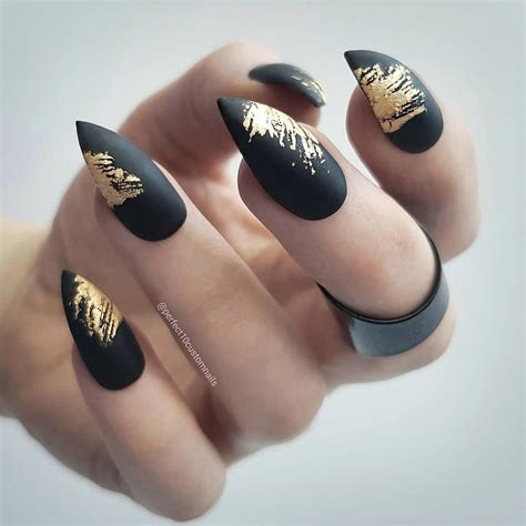 Earlier in the post we featured black nails with a gold cuticle design. Gold Rush ⚡ #acrylicnaildesigns | Black gold nails, Pointy nail designs, Matte nails design