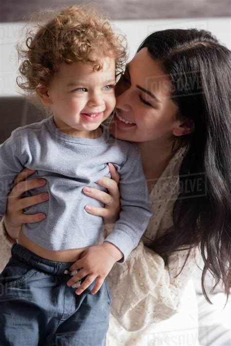 Caucasian Mother Hugging Son Stock Photo Dissolve