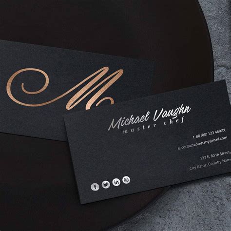 Black metal business cards are designed to impress with their matte black look and feel. luxury business card bronzesilver foil print | GraphType.com