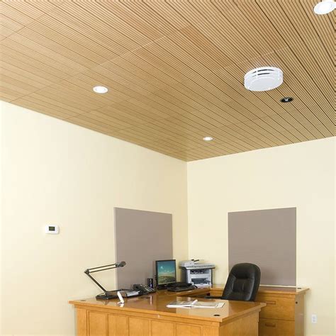 Suspended ceilings or suspended ceiling tiles became popular in north america in the 1960s, and can be made of fiber board or fiberglass, for example. Wooden suspended ceiling tile | Suspended ceiling ...