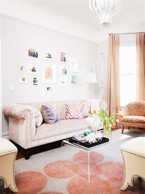 Peach Eclectic Living Room With Framed Gallery Wall | HGTV