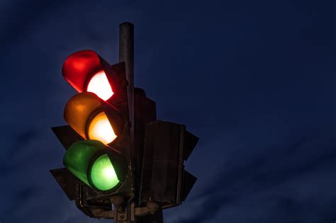 Black Traffic Light Turned On During Night Time Photo Free Light