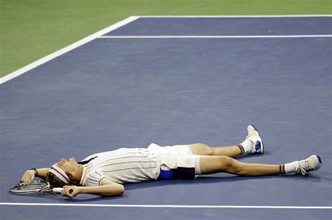 Both feet are about to align parallel to the net. A 6-Foot-6 German Aiming High Stumbles - WSJ