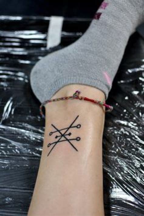 20 Tiny Tattoos With Big Meanings Tattoos Tattoos That Mean