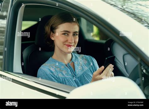 Beautiful Woman In Casual Wear Sitting On Driver Seat Portrait Cute Girl Driving A Car Concept