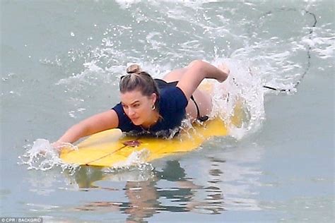 Margot Robbie Shows Off Her Strong Bikini Body As She Goes Surfing With