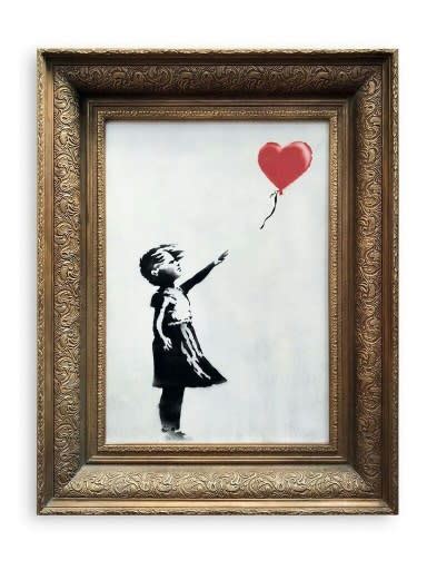 Banksy Shocks Art World By Shredding Mn Work At Auction