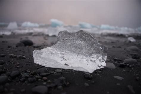 Piece Of Ice In Iceland Iceberg Black Beach Sand Stock Photo Image