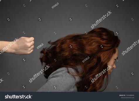 Womans Fist Hits Woman Head Problems Stock Photo 1334688896 Shutterstock