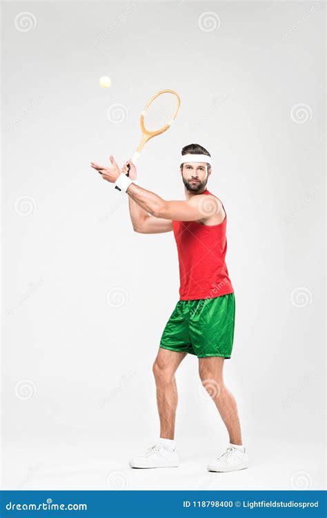 Handsome Man Playing Tennis With Retro Wooden Racket And Ball Stock