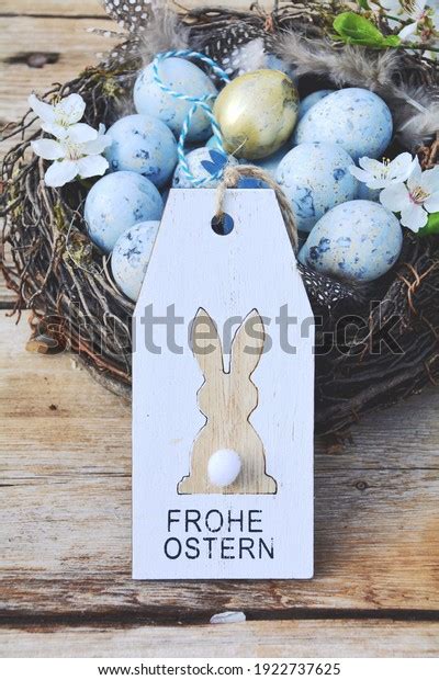 Easter Greeting Card With Text In German Frohe Ostern Easter Nest With Eggs Stock Image