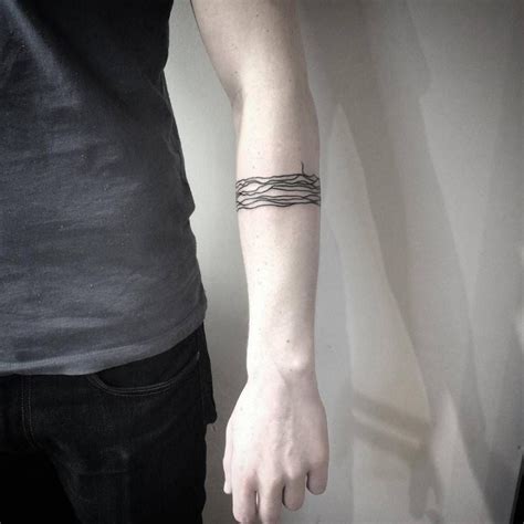 Abstract Minimalist Lines Tattoo On The Left Forearm By Vaigirdas Kofy