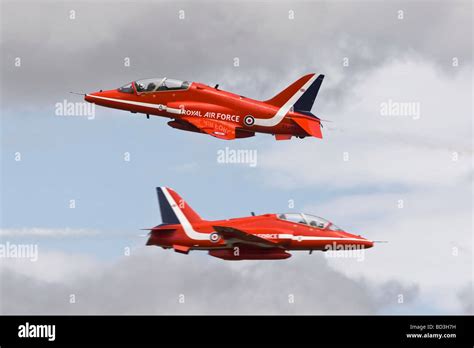 The Raf S Aerobatic Team The Red Arrows Synchro Pair On Cross Over