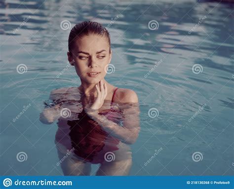 Pretty Woman Swimming In The Pool Vacation Luxury Close Up Model Stock