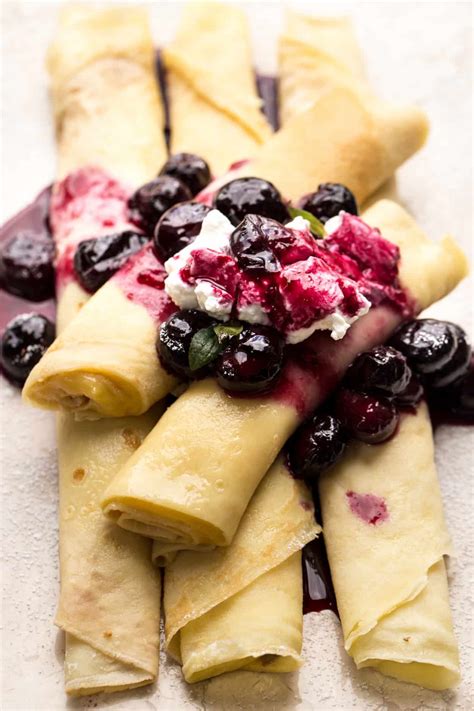 The Best Crepes Recipe With A Custard Filling And A Blueberry Sauce