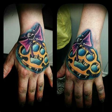 Great Concept Traditional Brass Knuckle Tattoo
