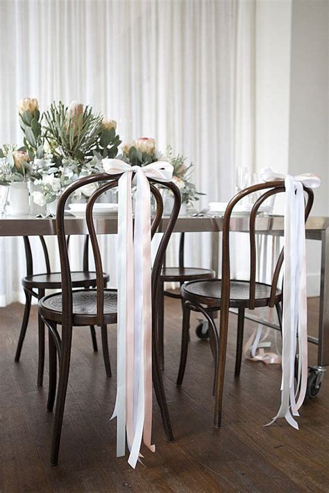 Ribbon wedding ideas pink ribbon adhered to back row of ceremony chairs. 55 Gorgeous Ways to Decorate Your Wedding Chairs - Page 5 ...
