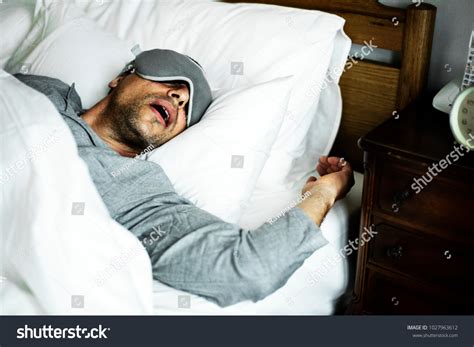 Man Sleeping On Bed Stock Photo 1027963612 Shutterstock